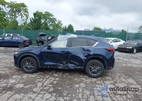 2021 Mazda Cx-5 Touring z USA, uszkodzony, nr VIN JM3KFBCM9M0497788